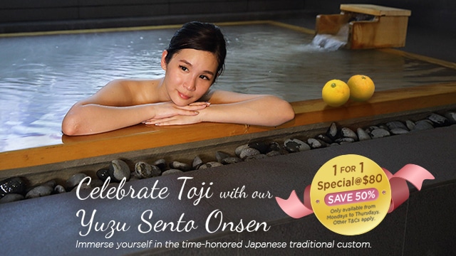 A woman is enjoying a facial in Singapore at an onsen spa.