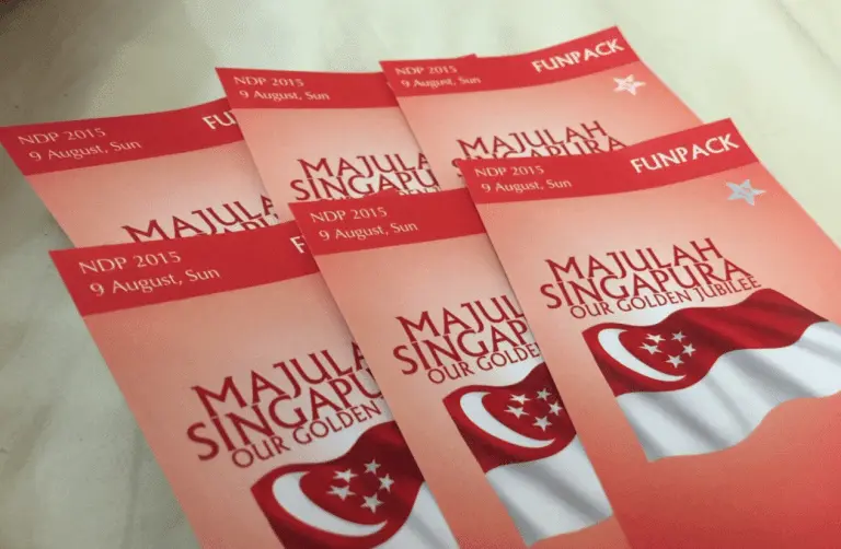 Five red and white tickets for Singapore’s National Day Parade 2015, featuring the national flag, the text "Majulah Singapura, Our Golden Jubilee," and promising a stunning view of the NDP fireworks display.