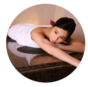 A woman enjoying a relaxing massage in a Japanese spa.