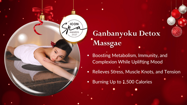 A promotional image for Ganbanyoku Detox Massage highlights benefits like boosting metabolism, relieving stress, and burning calories. A woman relaxes on a mat amid festive decorations, reminding viewers that a spa gift card makes the perfect holiday treat.