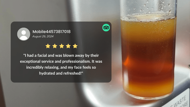 Close-up of a clear cylindrical container filled with a brown liquid, accompanied by a glowing review praising the exceptional hydrafacial service and professionalism with a five-star rating.
