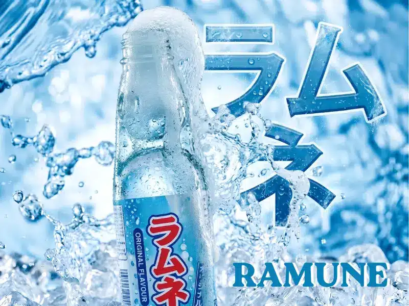 A Ramune soda bottle splashes in water, evoking a refreshing vibe with large blue Japanese katakana text and "Ramune" in English.
