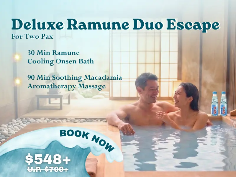 Man and woman relax in a wooden onsen bath with Ramune bottles nearby, highlighting our exclusive summer spa promotion—a special package for two featuring bath and massage, now priced at £548+ instead of £700+.